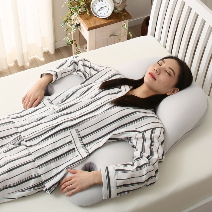 Pillow that wraps around the upper body