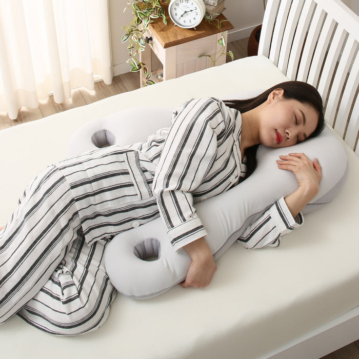 Pillow that wraps around the upper body